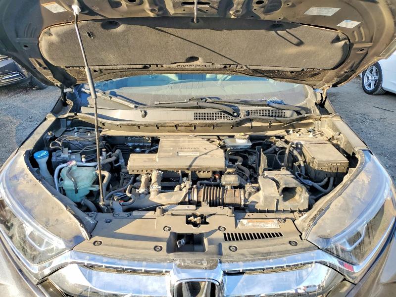 Photo 12 from auction – 2017 HONDA CR-V with VIN 7FARW1H50HE030353