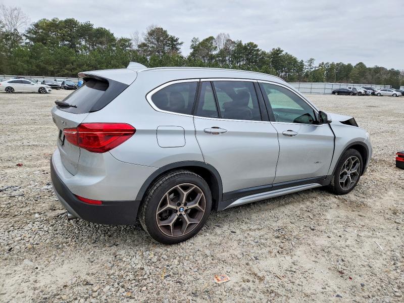 Photo 3 from auction – 2018 BMW X1 with VIN WBXHT3C32J5K26257