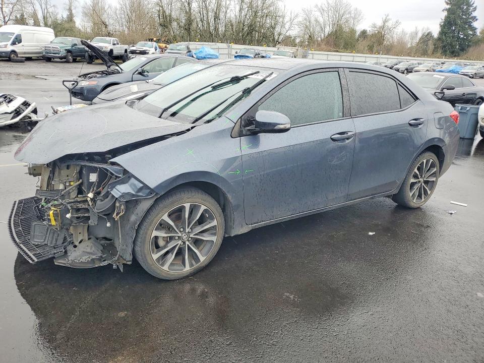 TOYOTA COROLLA 2017 with VIN 5YFBURHE7HP632965 - Photo from auction