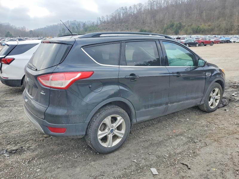 Photo 3 from auction – 2014 FORD ESCAPE SE with VIN 1FMCU9G9XEUC53896