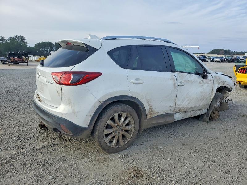Photo 3 from auction – 2014 MAZDA CX-5 GT with VIN JM3KE2DY0E0319208