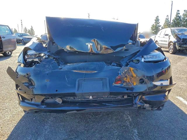 Photo 5 from auction – 2022 TESLA MODEL 3 with VIN 5YJ3E1EA3NF295478