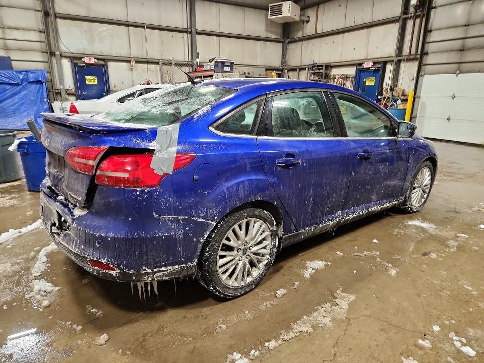 Photo 3 from auction – 2015 FORD FOCUS with VIN 1FADP3J29FL371685