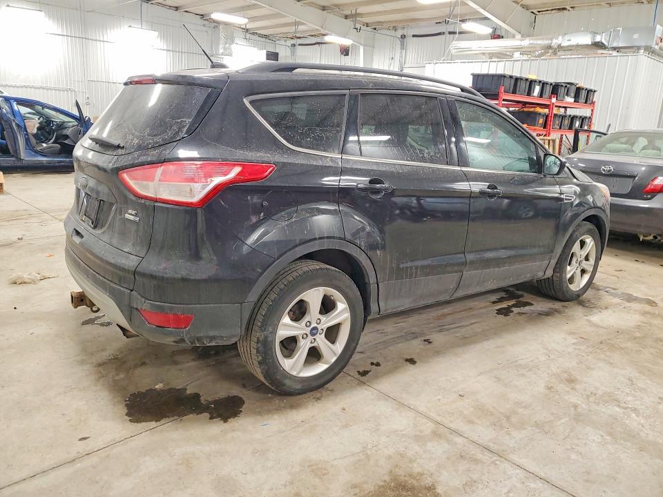 Photo 3 from auction – 2015 FORD ESCAPE SE with VIN 1FMCU9G98FUB62577