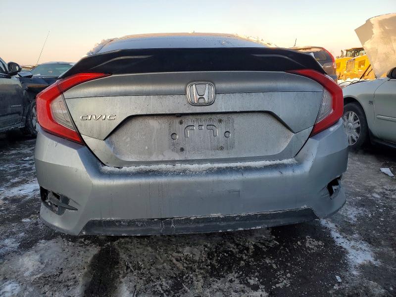 Photo 6 from auction – 2017 HONDA CIVIC LX with VIN 19XFC2F5XHE209555