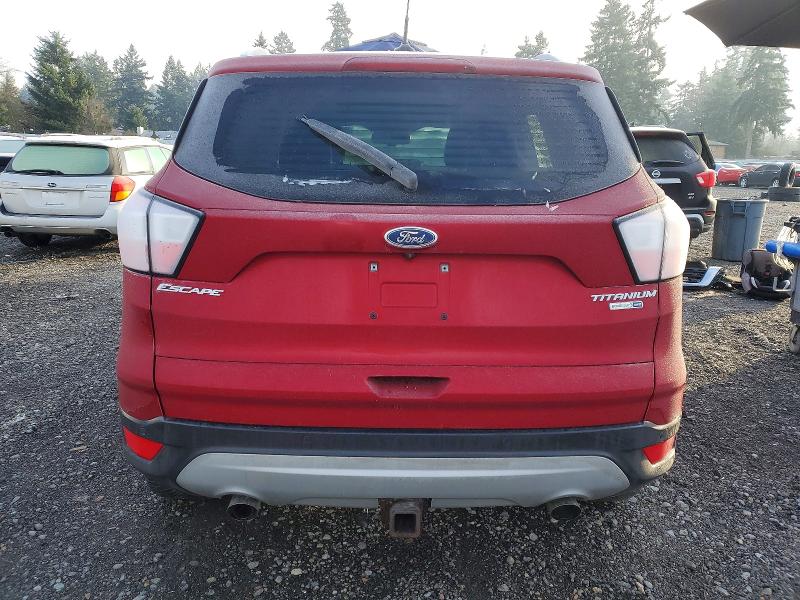 Photo 6 from auction – 2018 FORD ESCAPE TIT with VIN 1FMCU9J98JUC10354