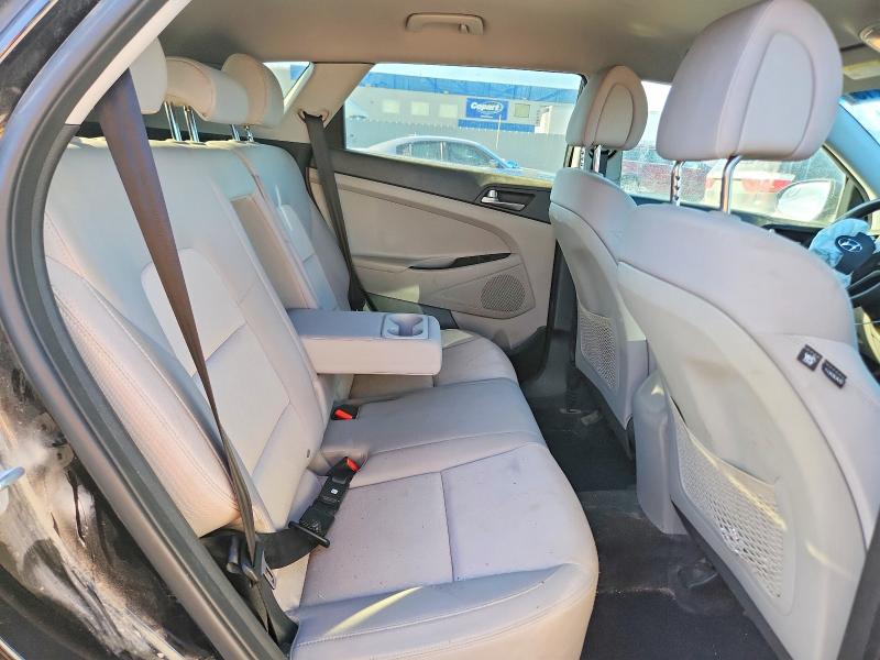 Photo 11 from auction – 2017 HYUNDAI TUCSON SE with VIN KM8J23A43HU577607