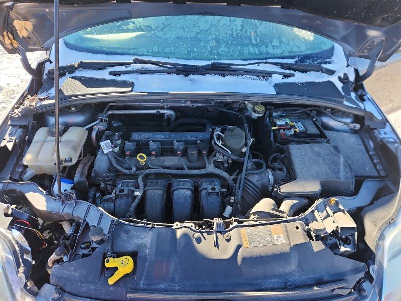 Photo 11 from auction – 2014 FORD FOCUS SE with VIN 1FADP3F21EL426136