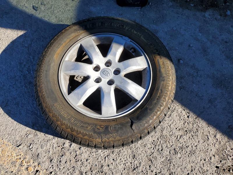 Foto 12 de la subasta – 2011 KIA SORENTO con VIN 5XYKT3A1XBG076380