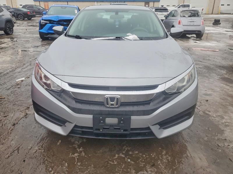 Photo 5 from auction – 2016 HONDA CIVIC LX with VIN 2HGFC2F58GH566463