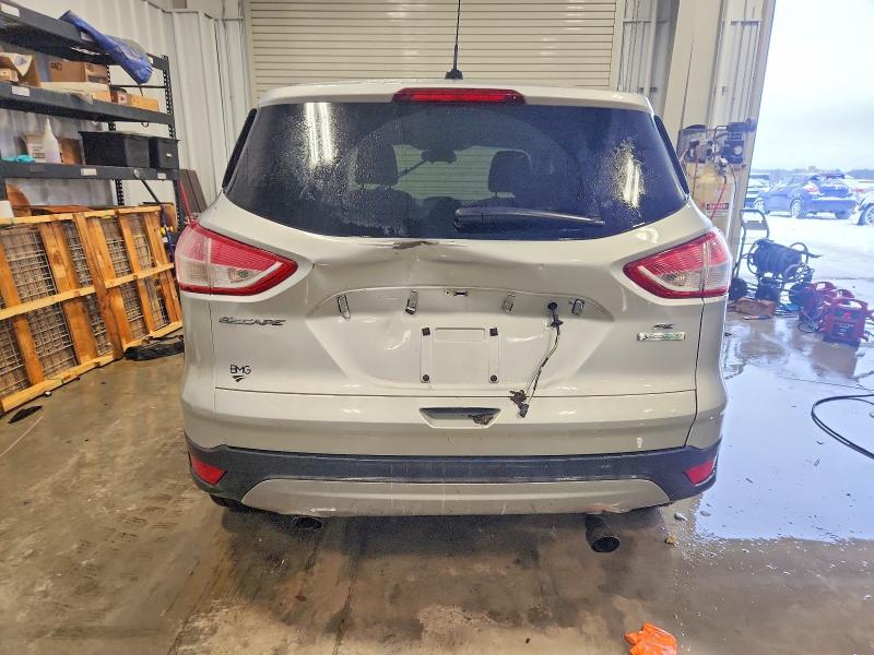 Photo 6 from auction – 2015 FORD ESCAPE SE with VIN 1FMCU0GX5FUB59775