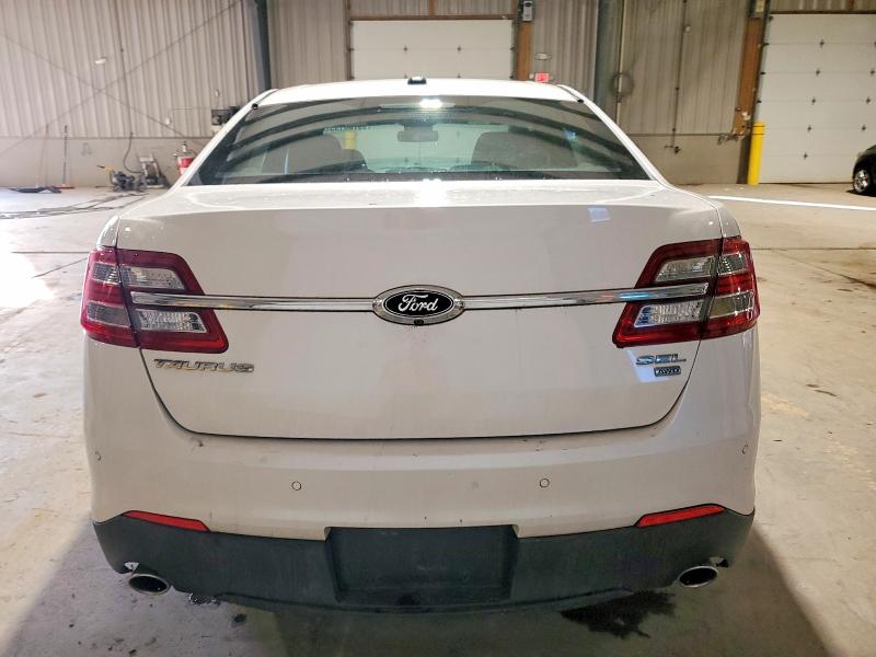 Photo 6 from auction – 2016 FORD TAURUS with VIN 1FAHP2H89GG150054