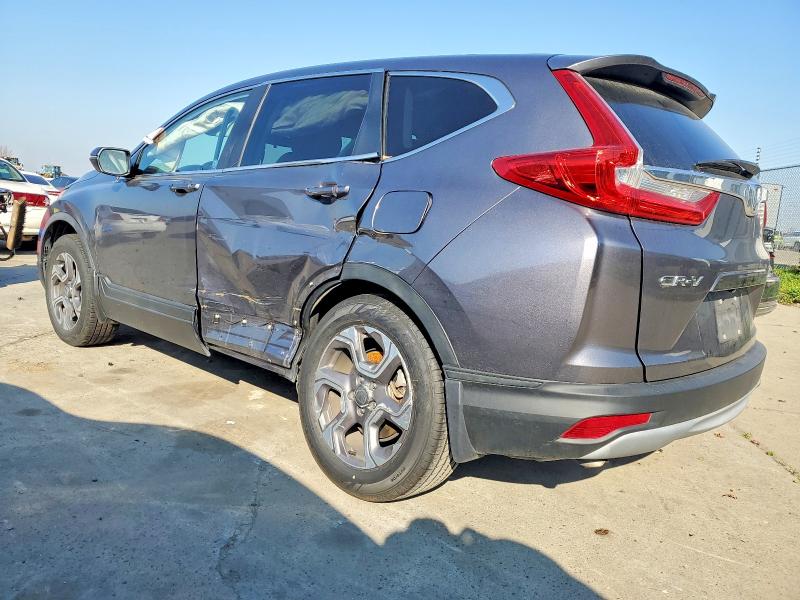 Photo 2 from auction – 2018 HONDA CR-V EX with VIN 7FARW2H54JE010717