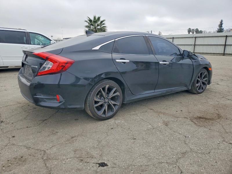 Photo 3 from auction – 2016 HONDA CIVIC TOUR with VIN 2HGFC1F90GH648491