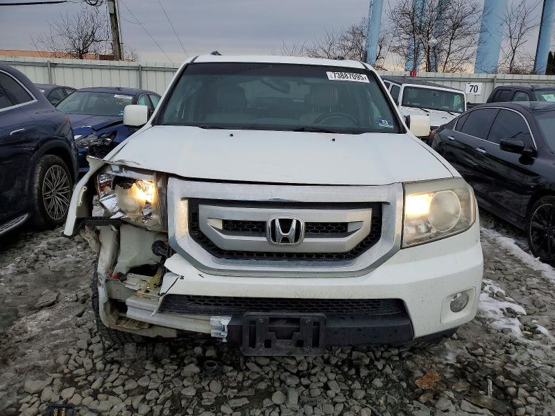Photo 5 from auction – 2011 HONDA PILOT EXL with VIN 5FNYF4H56BB104733