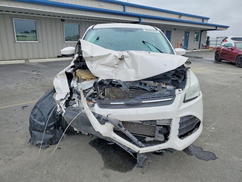 Photo 5 from auction – 2015 FORD ESCAPE SE with VIN 1FMCU0G95FUA25785