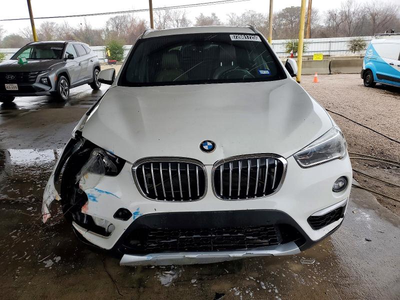 Photo 5 from auction – 2017 BMW X1 XDRIVE2 with VIN WBXHT3Z31H4A54622