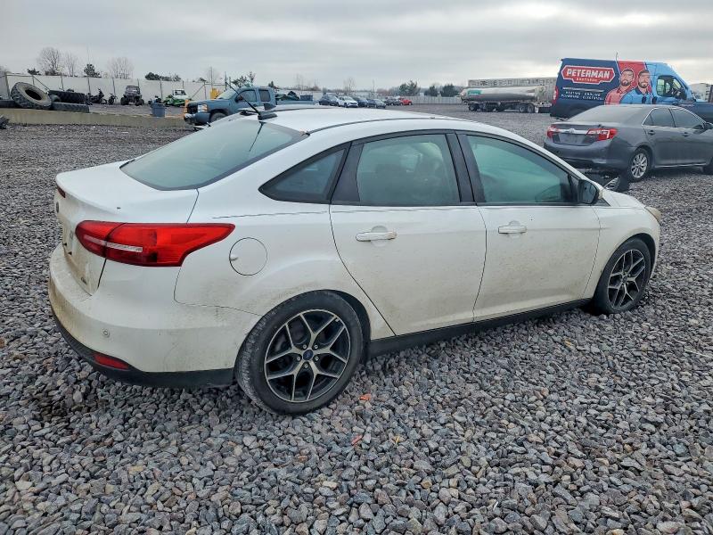 Photo 3 from auction – 2017 FORD FOCUS SEL with VIN 1FADP3H26HL249004