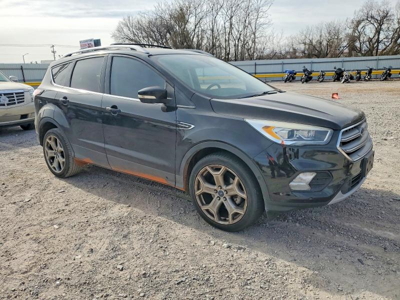 Photo 4 from auction – 2017 FORD ESCAPE TIT with VIN 1FMCU0JD2HUA27087