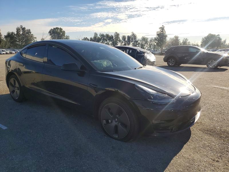 Photo 4 from auction – 2023 TESLA MODEL 3 with VIN 5YJ3E1EA5PF670371