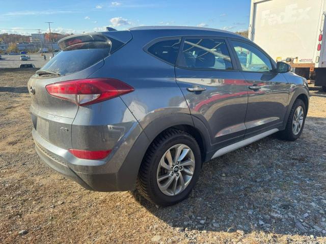 Photo 4 from auction – 2018 HYUNDAI TUCSON SEL with VIN KM8J3CA48JU733742