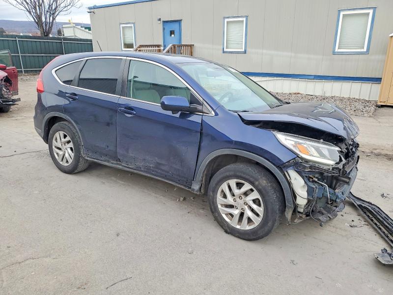 Photo 4 from auction – 2015 HONDA CR-V EX with VIN 2HKRM4H58FH604619