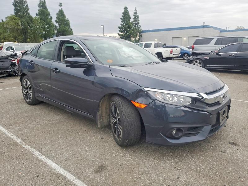 Photo 4 from auction – 2018 HONDA CIVIC EX with VIN JHMFC1F36JX012668