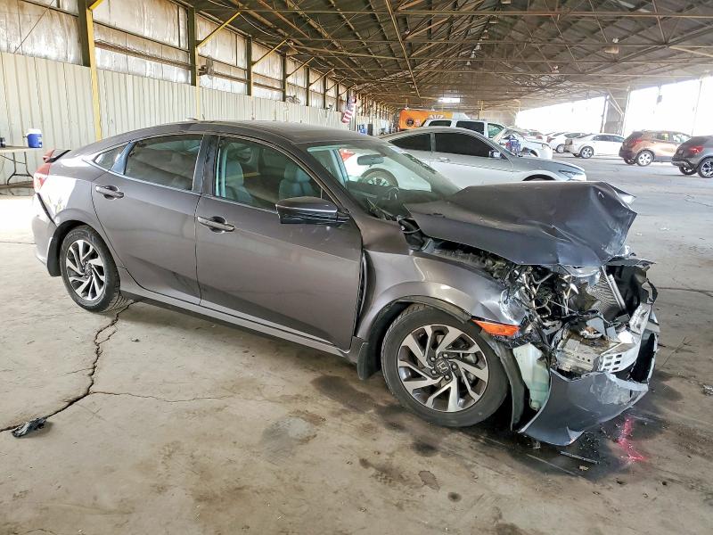 Photo 4 from auction – 2018 HONDA CIVIC with VIN 19XFC2F72JE033012