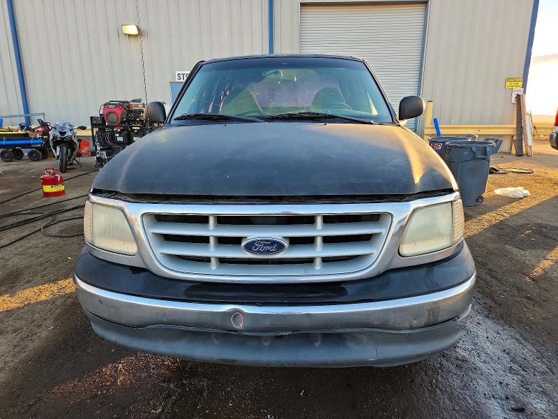 Photo 5 from auction – 1999 FORD F150 with VIN 1FTRX07W0XKB62786