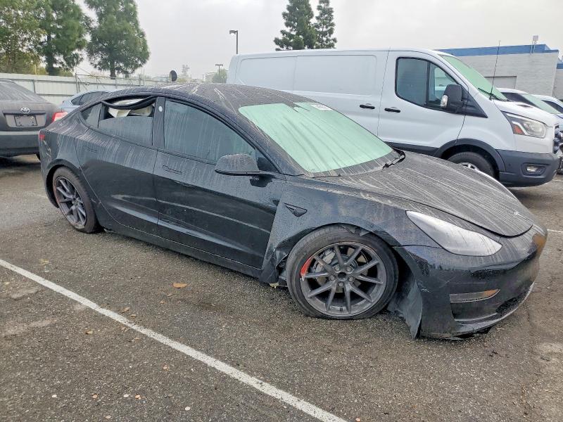 Photo 4 from auction – 2021 TESLA MODEL 3 with VIN 5YJ3E1EA2MF051206