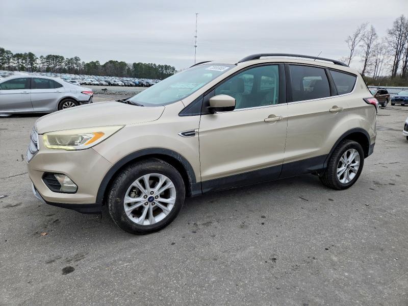 FORD ESCAPE 2017 with VIN 1FMCU0GDXHUE43623 - Photo from auction