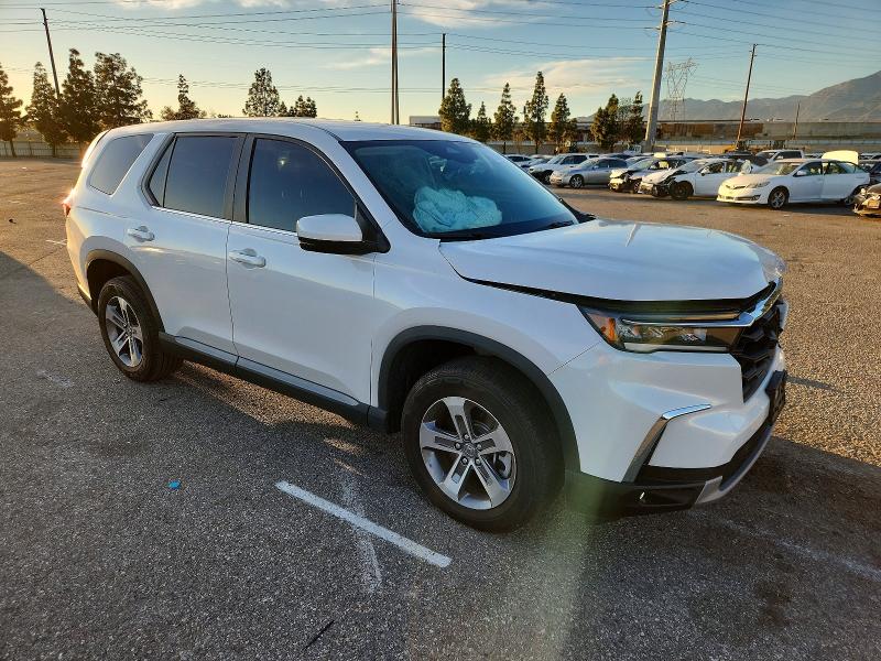Photo 4 from auction – 2023 HONDA PILOT EXL with VIN 5FNYG2H58PB004187