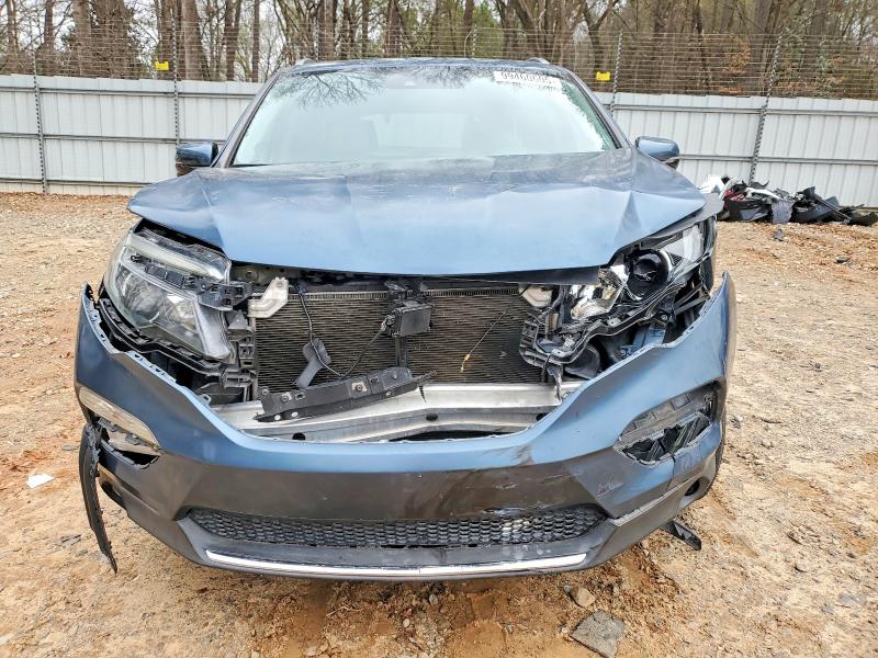 Photo 5 from auction – 2017 HONDA PILOT TOUR with VIN 5FNYF5H90HB019128