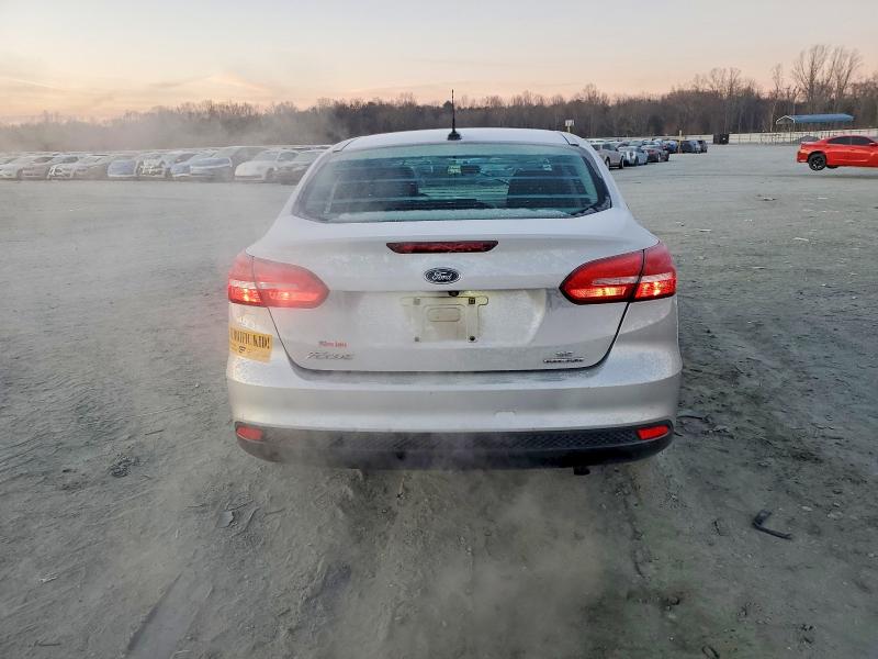 Photo 6 from auction – 2015 FORD FOCUS SE with VIN 1FADP3F24FL233853