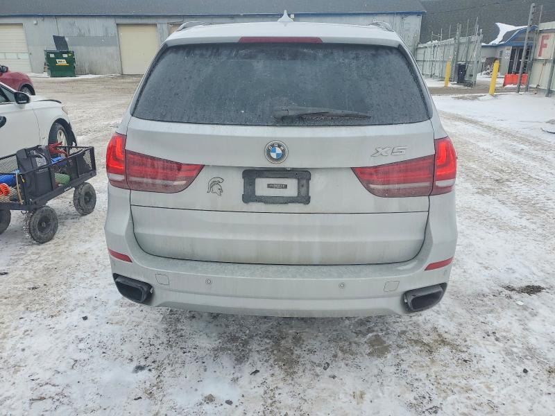 Photo 6 from auction – 2015 BMW X5 XDRIVE5 with VIN 5UXKR6C54F0J73973