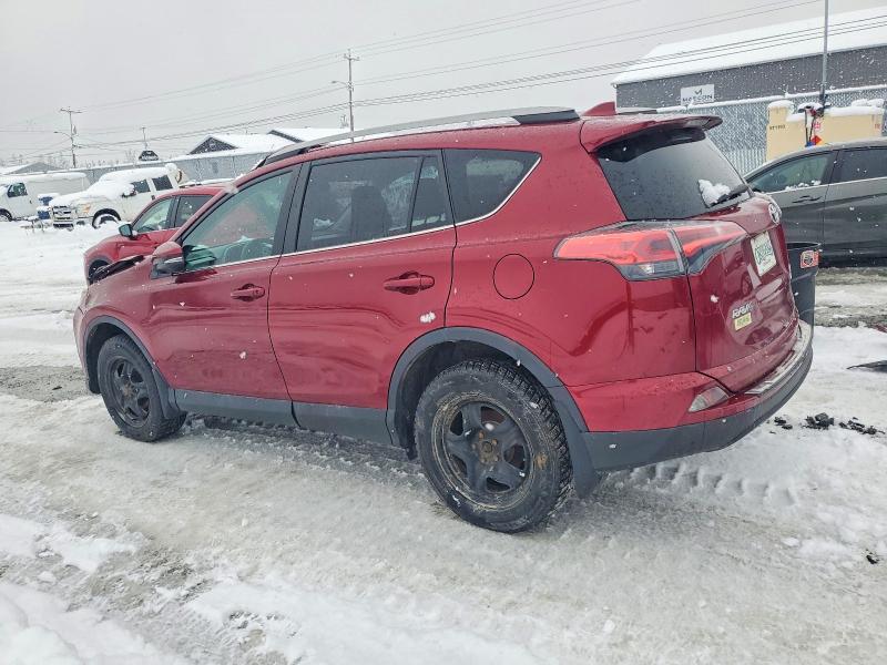 Photo 2 from auction – 2018 TOYOTA RAV4 LE with VIN 2T3BFREV9JW840484