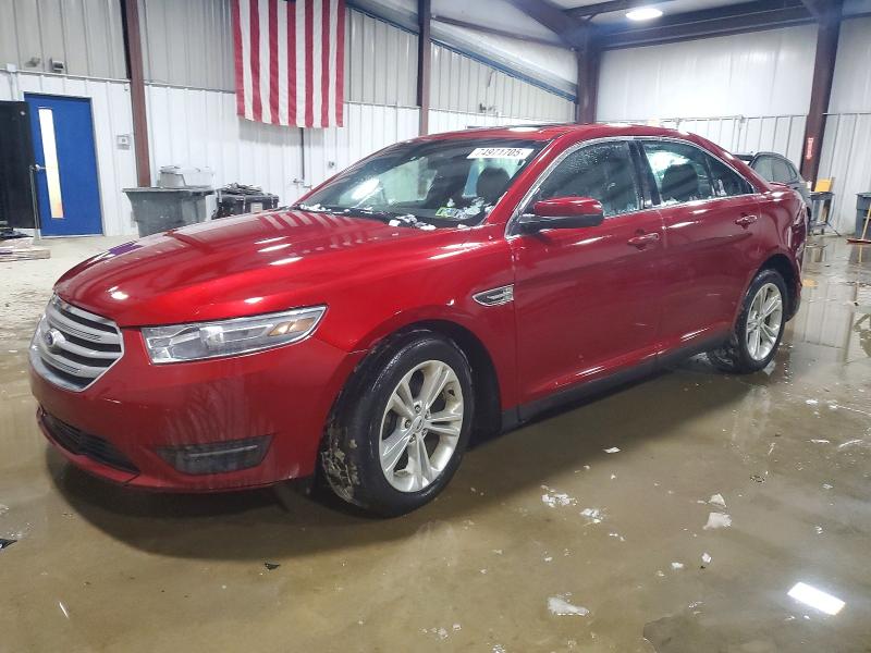FORD TAURUS 2014 with VIN 1FAHP2E8XEG110454 - Photo from auction