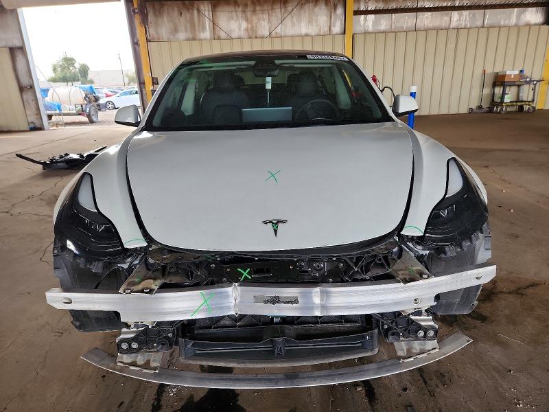 Photo 5 from auction – 2022 TESLA MODEL 3 with VIN 5YJ3E1EB2NF193775