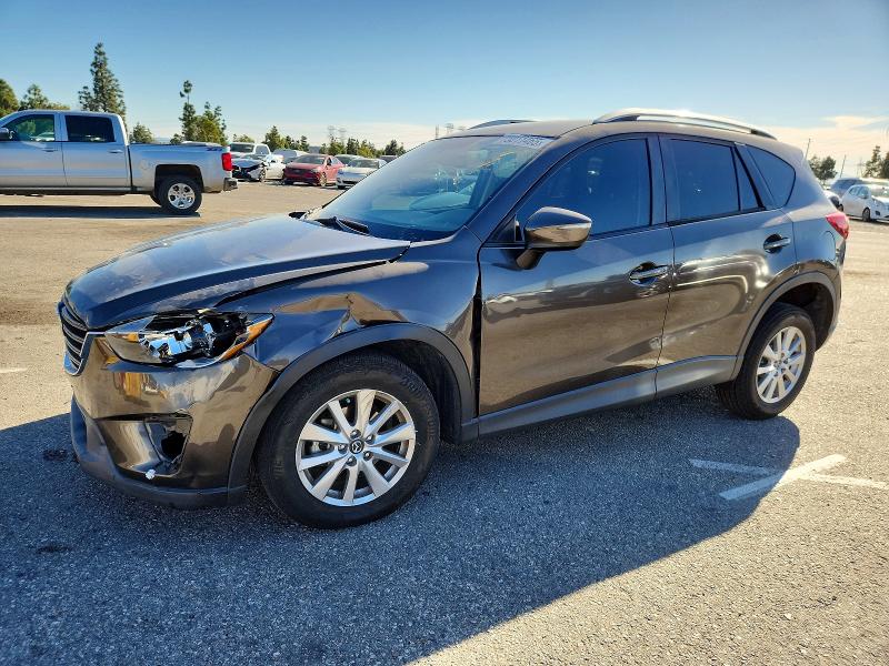MAZDA CX-5 2016 with VIN JM3KE2BY8G0906603 - Photo from auction