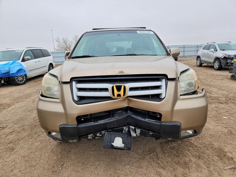Photo 5 from auction – 2006 HONDA PILOT EX with VIN 5FNYF18486B006556