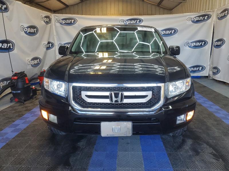 Photo 5 from auction – 2011 HONDA RIDGELINE with VIN 5FPYK1F50BB452435