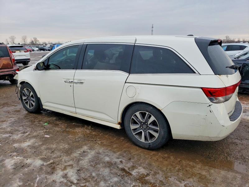 Photo 2 from auction – 2014 HONDA ODYSSEY with VIN 5FNRL5H90EB501865