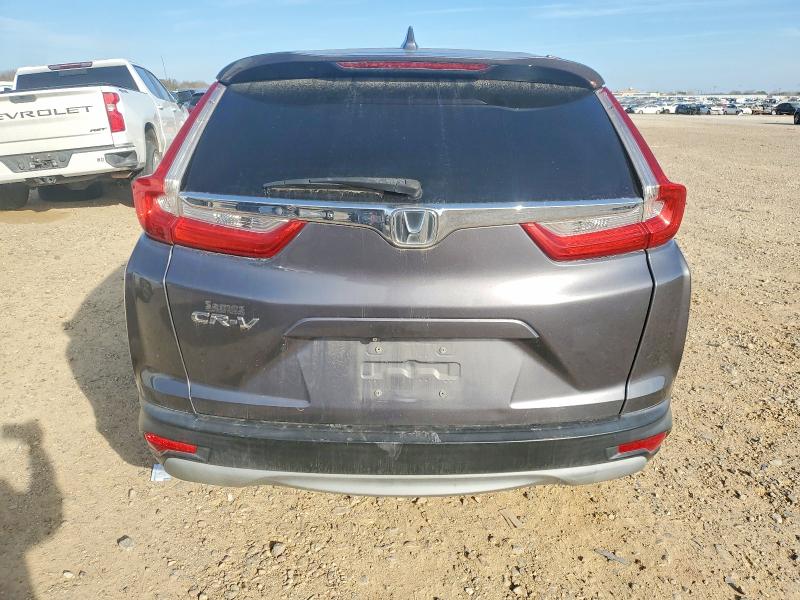 Photo 6 from auction – 2018 HONDA CR-V with VIN 5J6RW1H83JA004488
