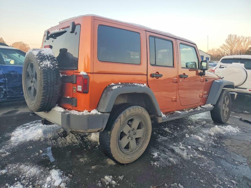 Photo 3 from auction – 2011 JEEP WRANGLER U with VIN 1J4HA5H1XBL572649
