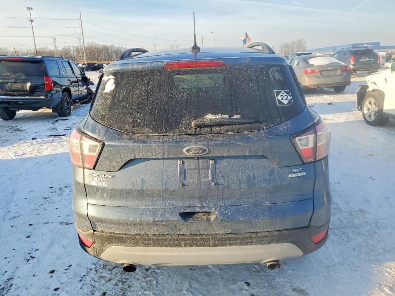 Photo 6 from auction – 2018 FORD ESCAPE SE with VIN 1FMCU0GD7JUC03130