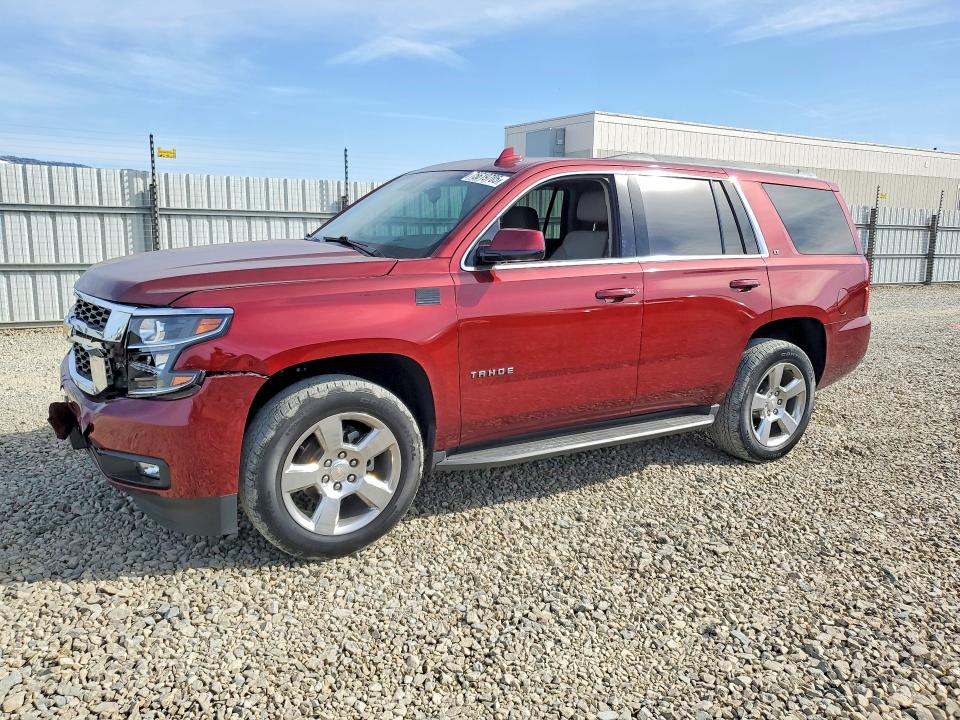 CHEVROLET TAHOE K150 2019 with VIN 1GNSKBKC5KR207754 - Photo from auction
