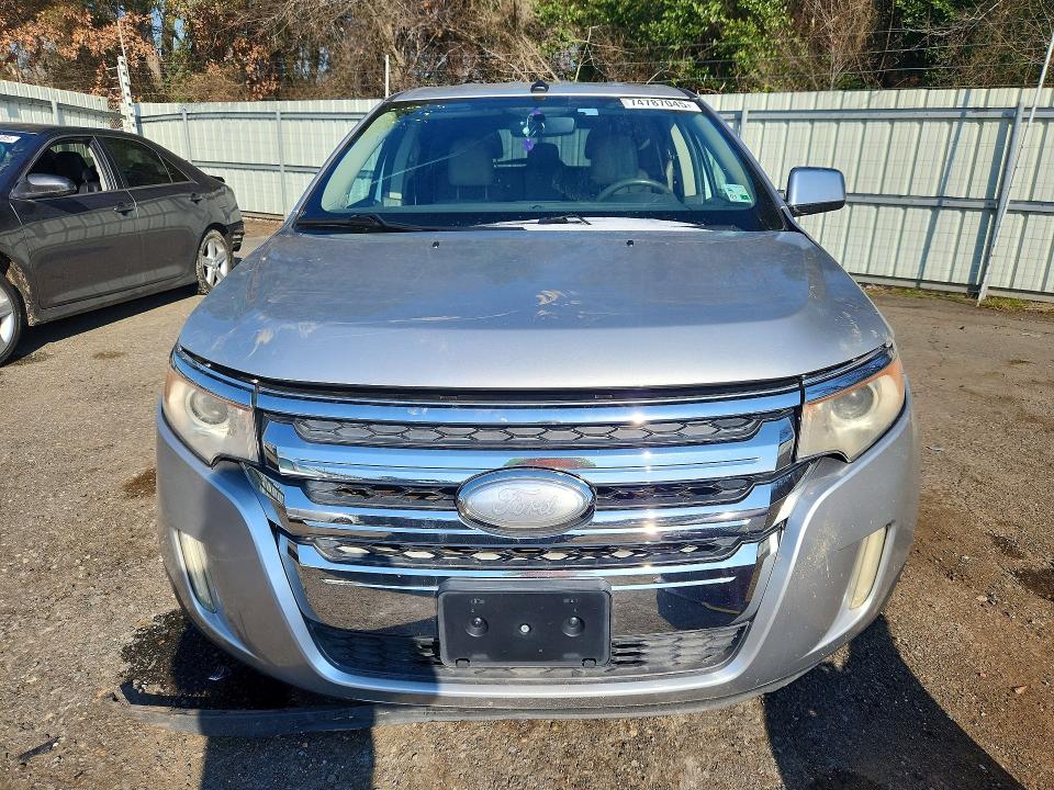 Photo 5 from auction – 2011 FORD EDGE with VIN 2FMDK3KCXBBA77993