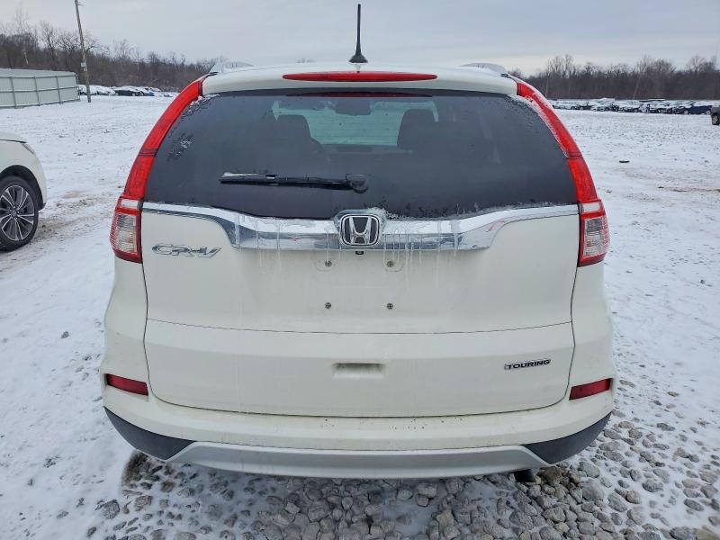 Photo 6 from auction – 2016 HONDA CR-V TOURI with VIN 5J6RM3H96GL028792