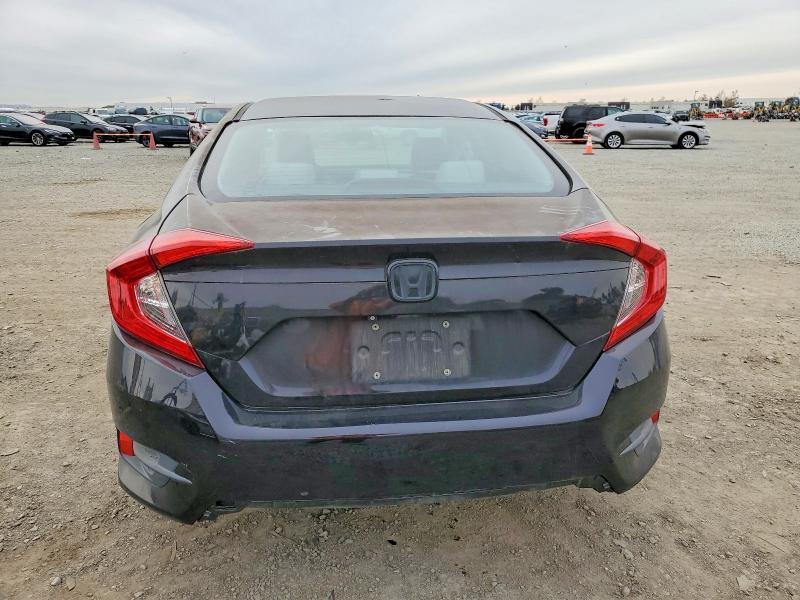 Photo 6 from auction – 2017 HONDA CIVIC LX with VIN 2HGFC2F59HH535918