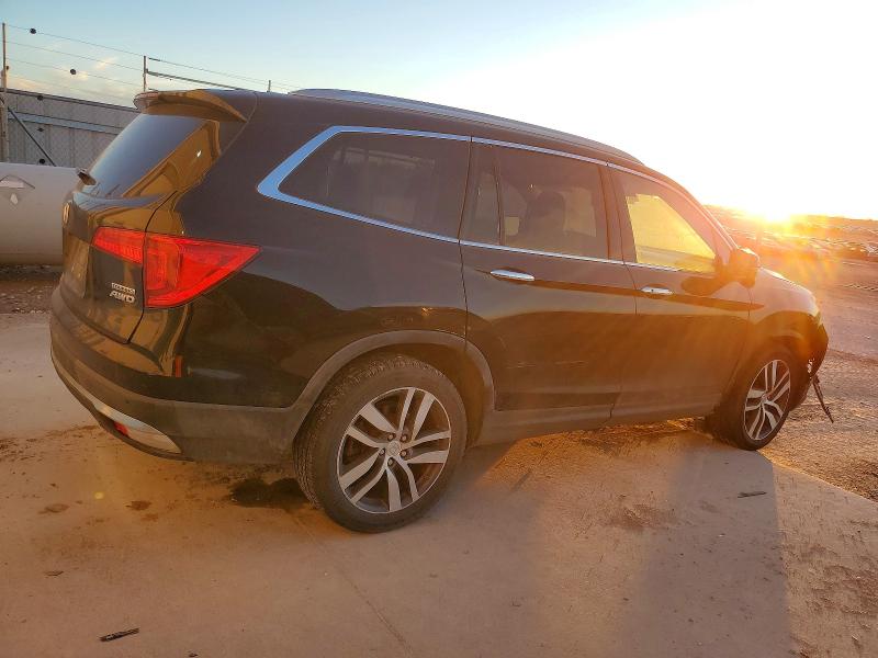 Photo 3 from auction – 2016 HONDA PILOT with VIN 5FNYF6H92GB003940